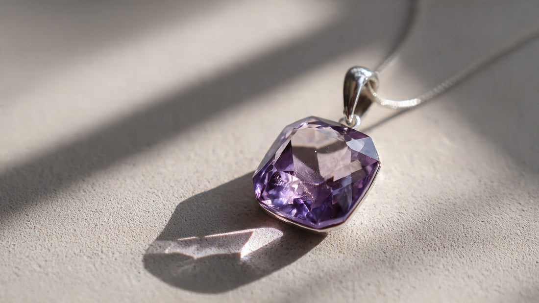 Sterling silver pendant with an unconventional geometric amethyst cut