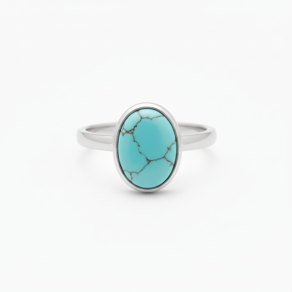 Turquoise Oval Ring worn on hand showing turquoise stone and band design