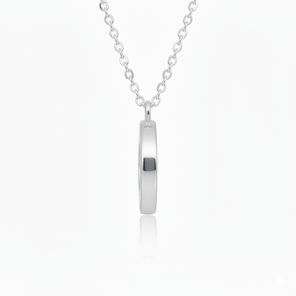 Silver necklace with a cylindrical pendant on a white background