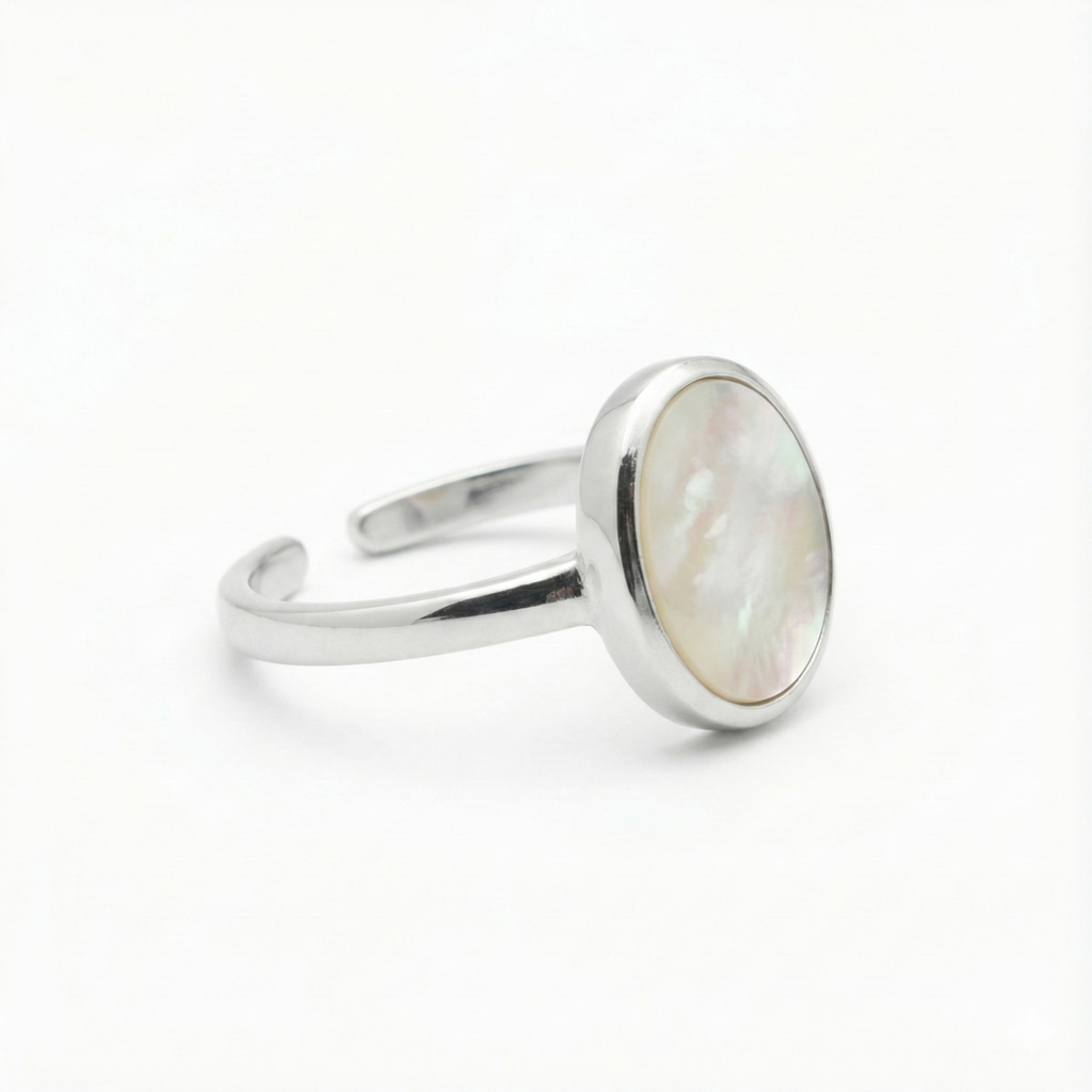Mother of Pearl Oval Ring in sterling silver with smooth, iridescent white gemstone setting