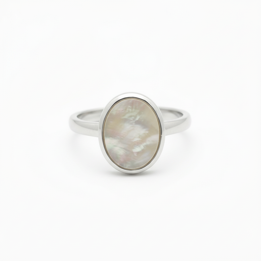 Mother of Pearl Oval Ring worn on hand showing stone detail and band design