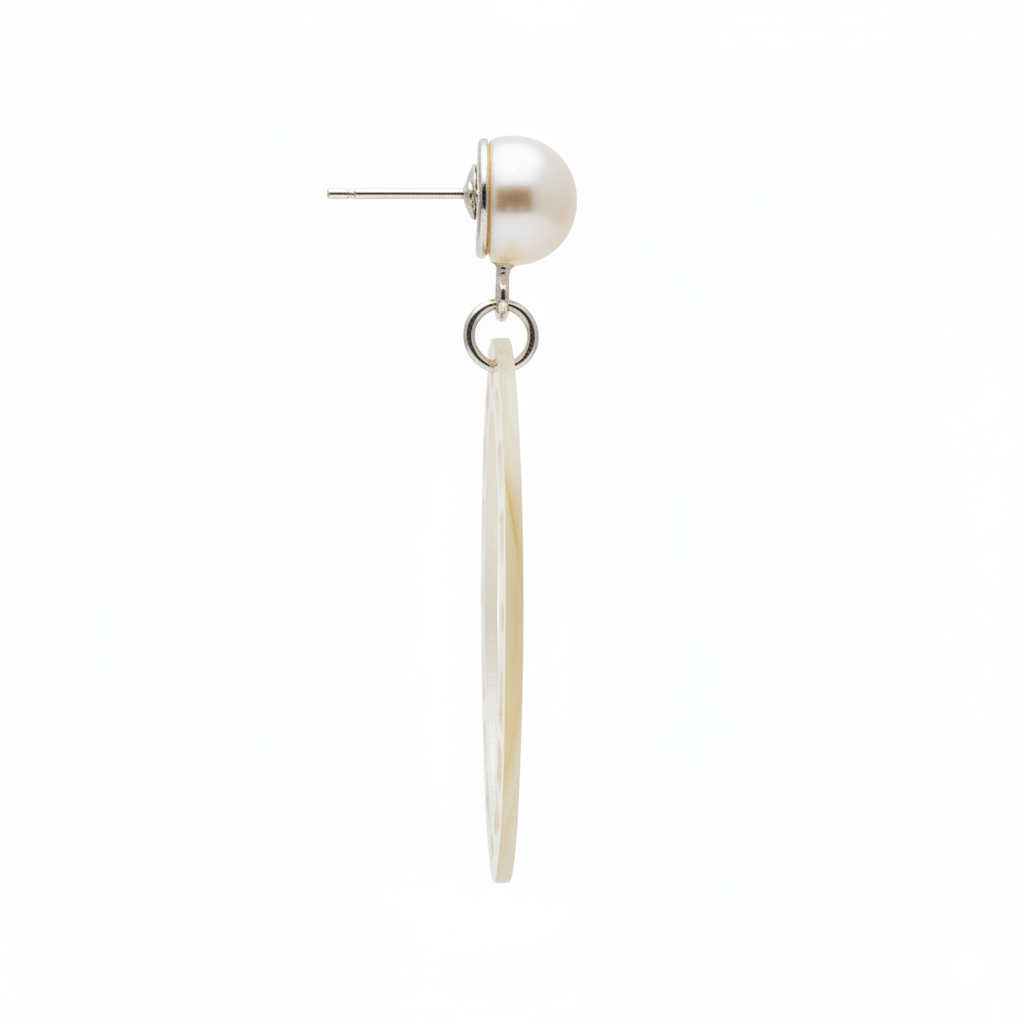 Earring with pearl and long thin component on a white background