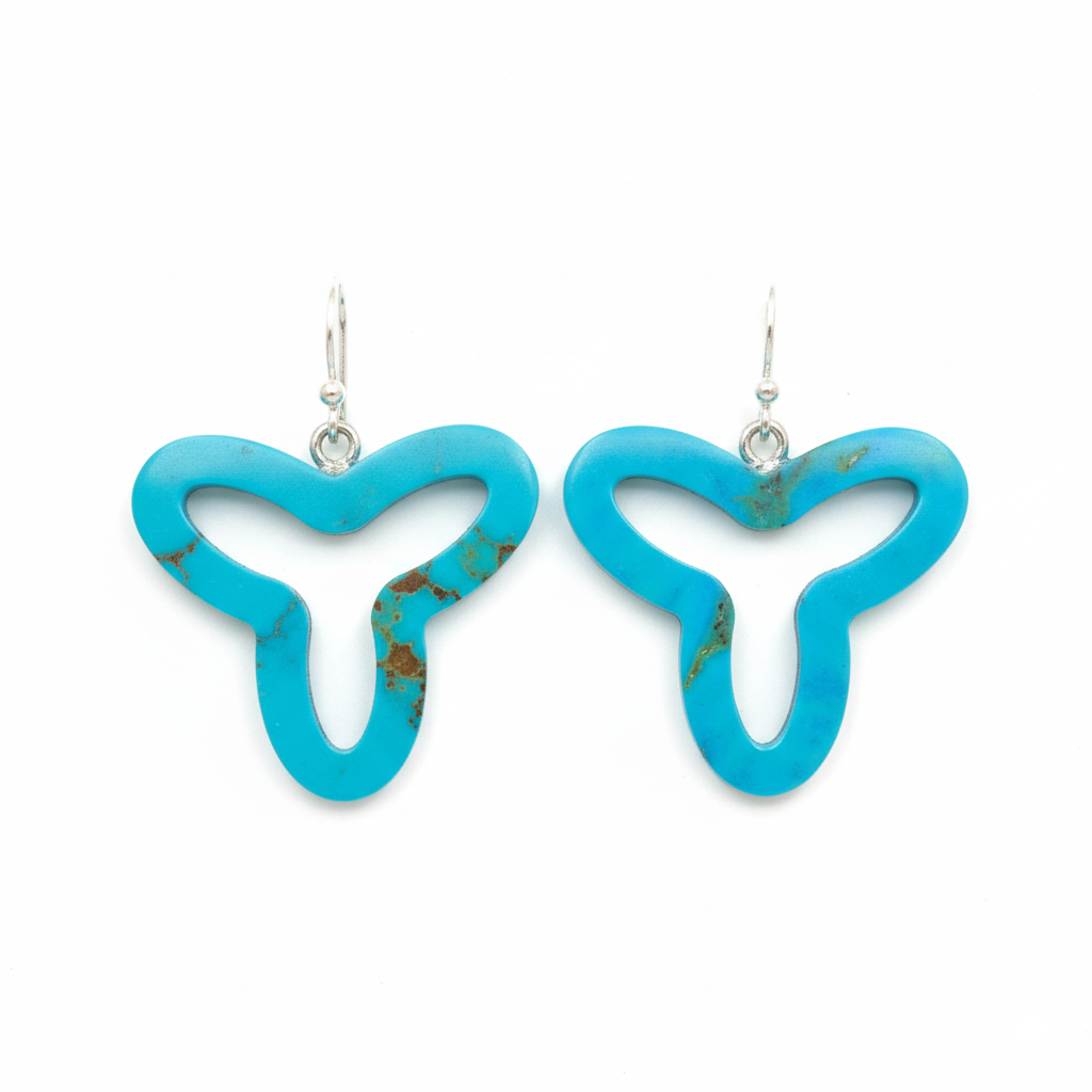 Turquoise butterfly-shaped earrings on a white background