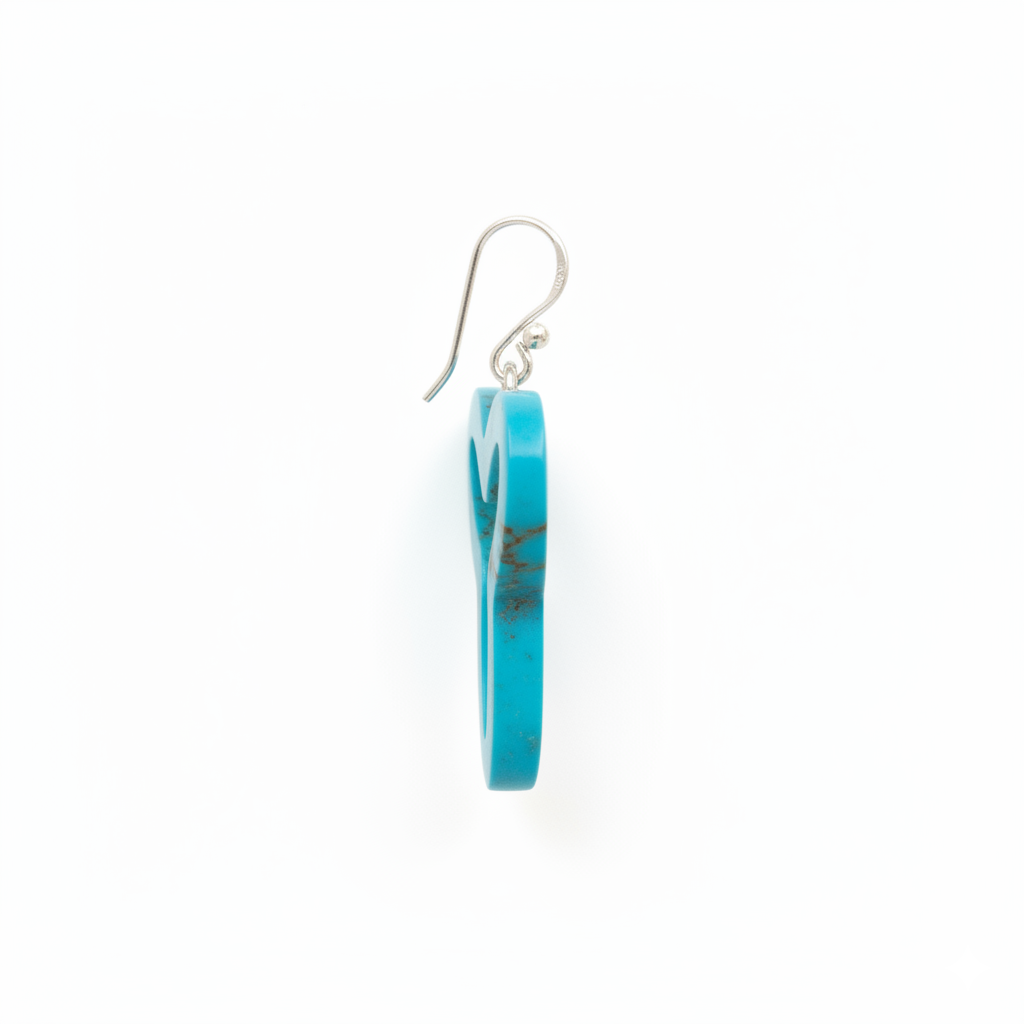 Turquoise circular earring on a white background